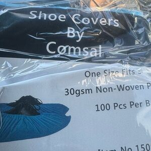 3 packs of Blue Shoe Covers by Comsal .. 3 packs for $30.
